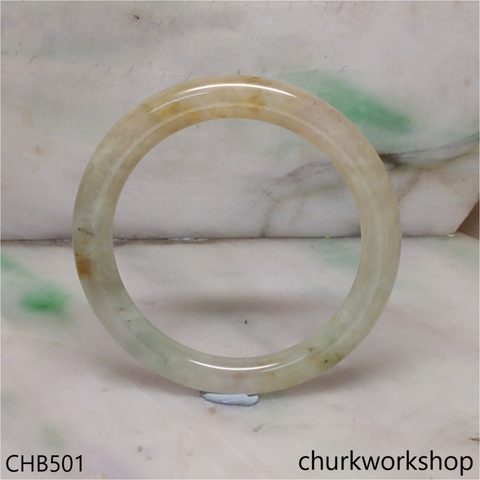 Light green with splotches light brown bangle