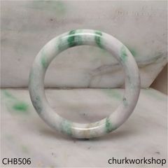 White base with splotches green & bluish green jade bangle