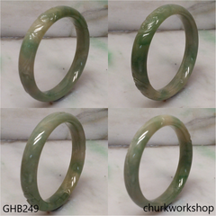 Small carved bluish green jade bangle