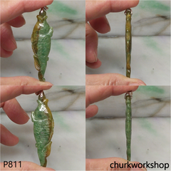 Green and brown jade fish pendant