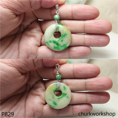 White base with splotches green jade Donut pendant