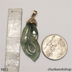 Bluish green jade leaf pendant in 14k gold